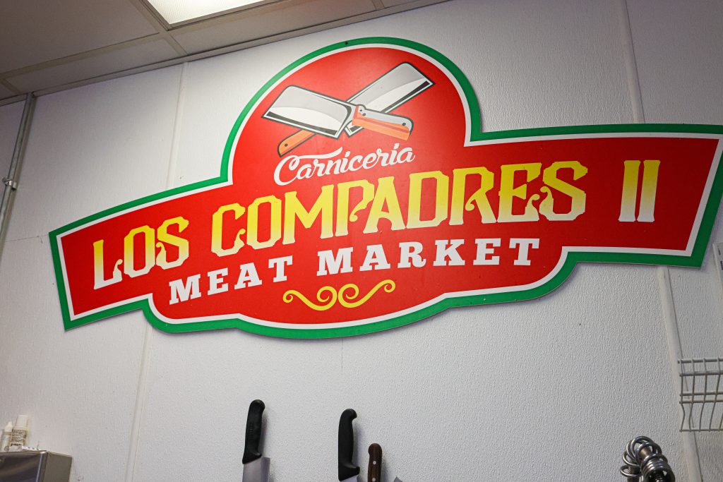 Los Compadres logo.
