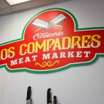Los Compadres logo.